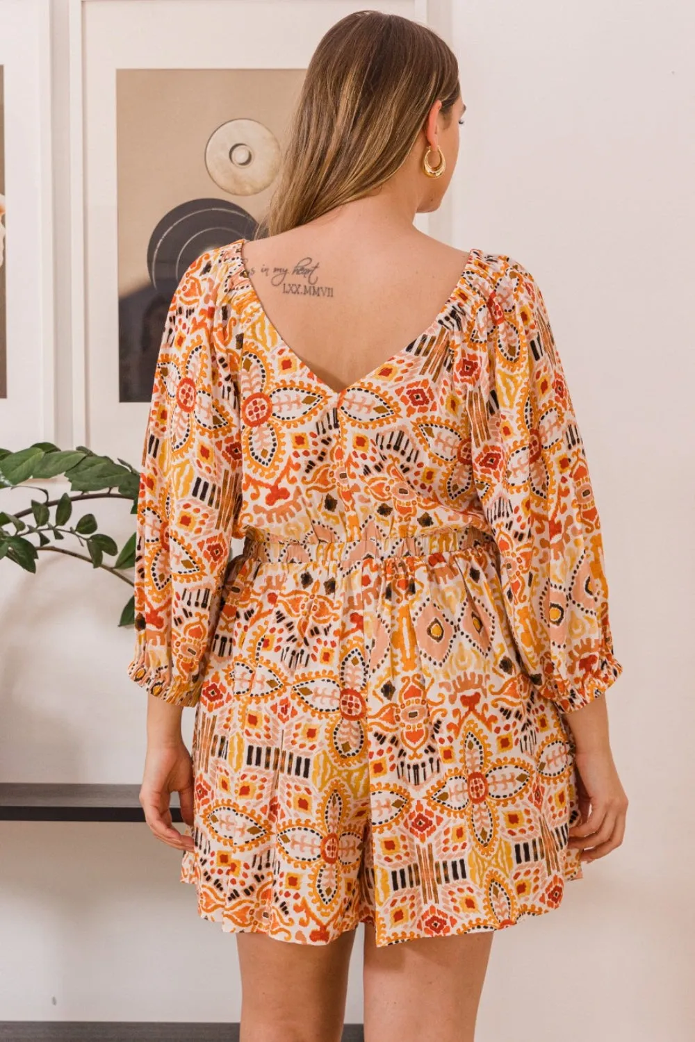 Women's ODDI Full Size Printed Ruff Sleeve Romper with Pockets